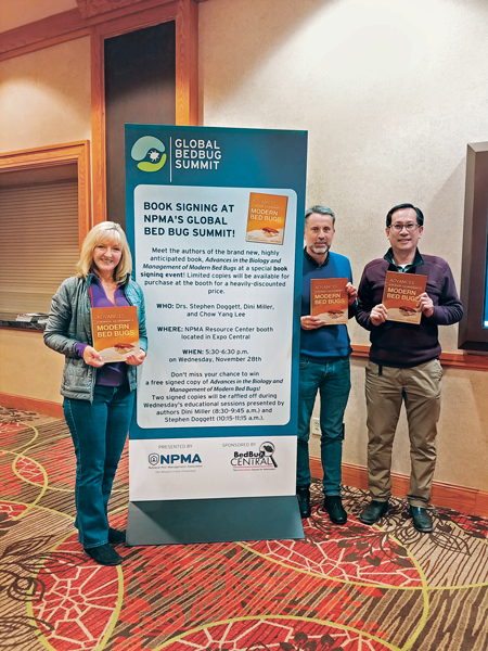 From left, Drs. Miller, Stephen Doggett and Chow-Yang Lee display copies of the book they co-edited, Advances in the Biology and Management of Modern Bed Bugs. (Photo: Dr. Dini Miller)